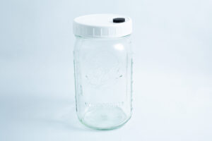 Mycology Ball 1L Kilner jar with injection port and air vent, genuine and autoclavable, ideal for storage or mycology projects, shown on a plain white background.