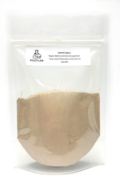 A clear pouch filled with light brown powder labelled as organic azomite fertiliser and supplement.