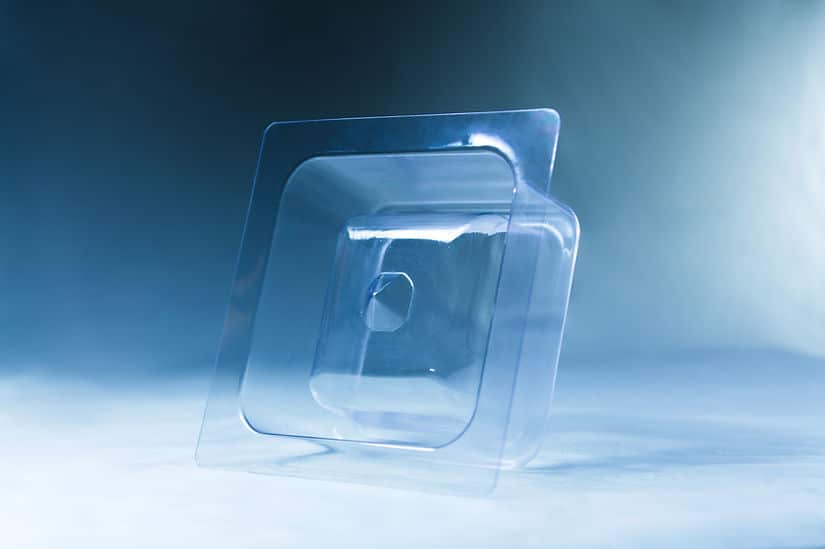 The Mycelium Mould Growth Form - Plant Pot Heavy Duty (Reusable) is displayed on a flat surface with a blue gradient background, its clear plastic design inspired by natural mycelium mould growth patterns.