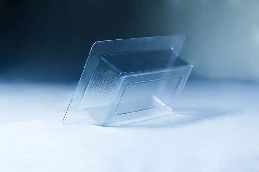 The Mycelium Mould Growth form - Brick (Reusable) is shown as a clear plastic blister tray, tilted on a white and blue gradient surface.