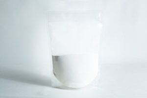A clear, resealable plastic pouch containing Agar Mix MYAG Antibacterial Malt Extract Yeast white powder is displayed on a plain white background.