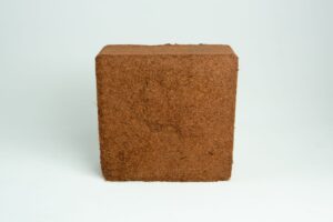 A 5 kg, 60L coco coir block (washed of salts, buffered RHP grade) is displayed against a plain white background.