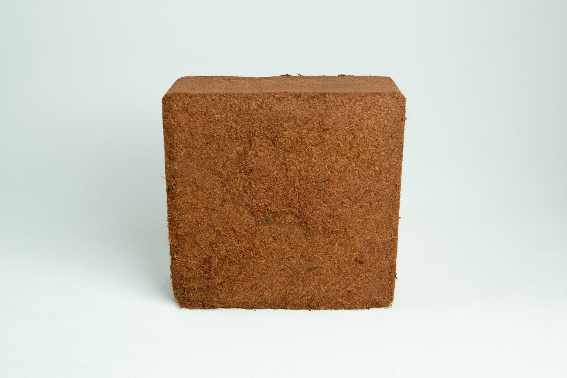 A 5 kg, 60L coco coir block (washed of salts, buffered RHP grade) is displayed against a plain white background.
