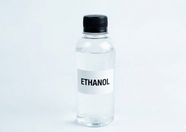 A clear plastic bottle with a black cap labelled ETHANOL, ideal for refilling your glass alcohol burner or lamp spirit, set against a plain white background.