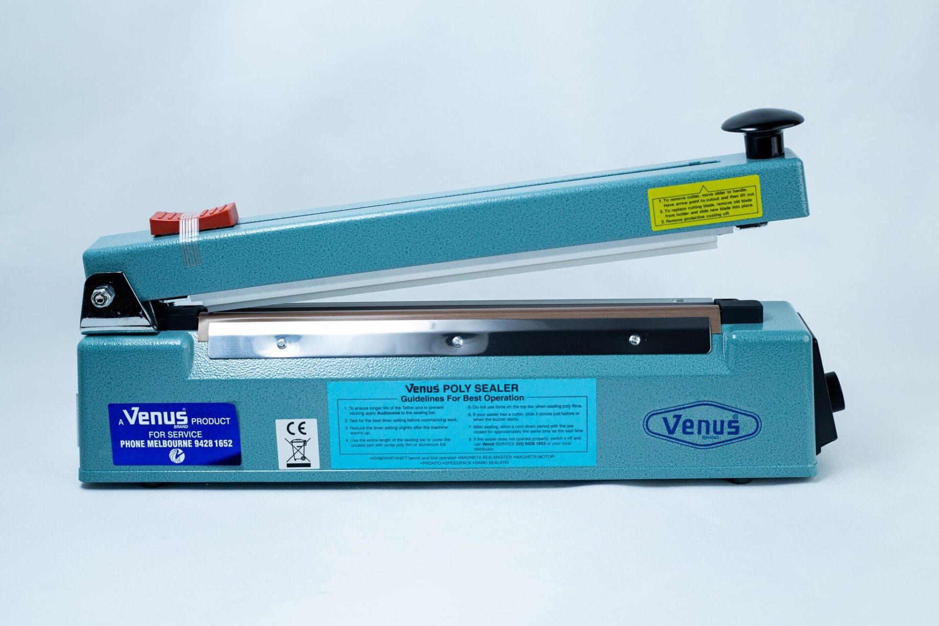 A Heat Sealer 30cm Seal Width 5mm with cutter and a raised sealing arm is shown on a white background.