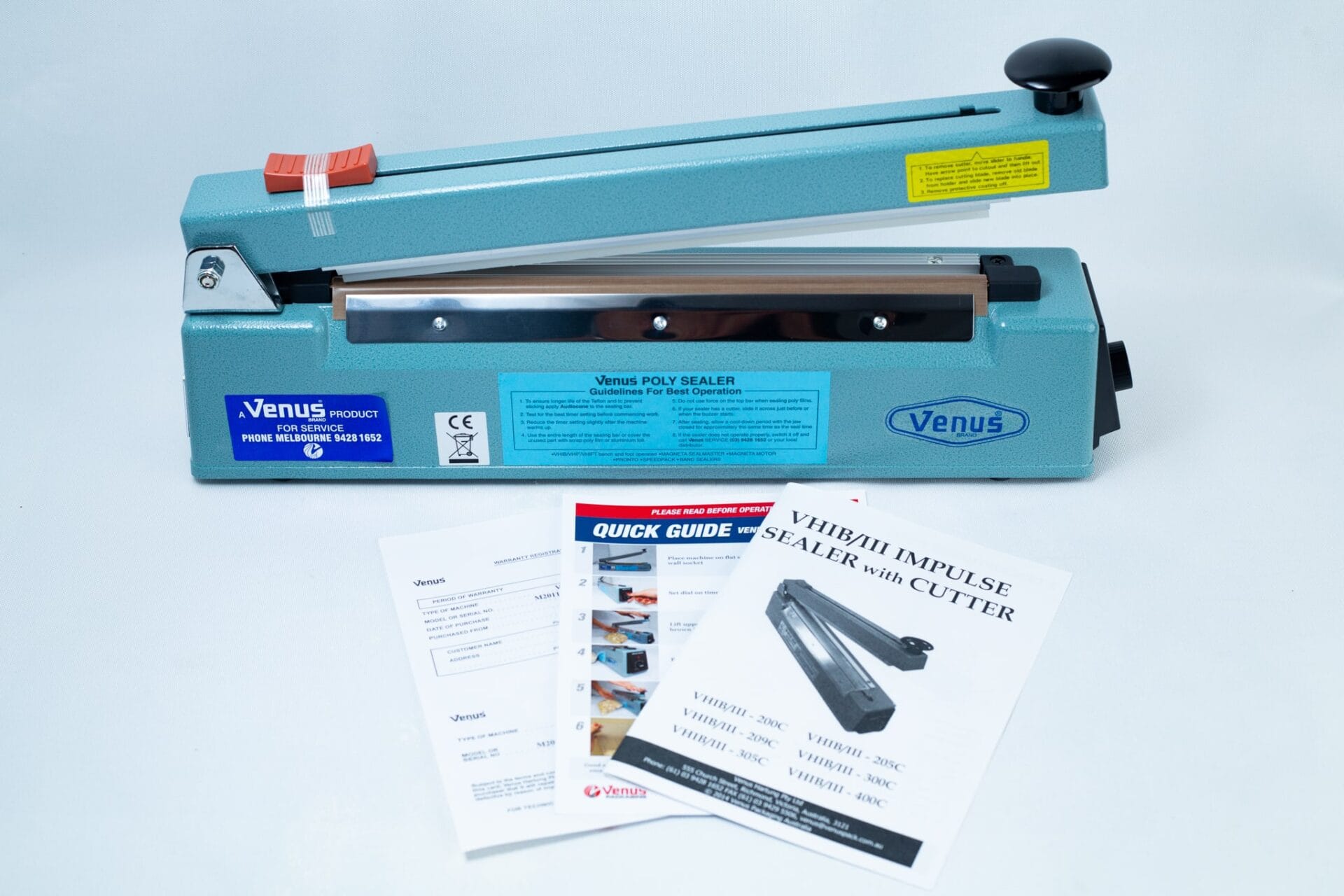 Heat Sealer 30cm Seal Width 5mm with cutter, shown together with instruction manuals and quick guide sheets for easy set-up.