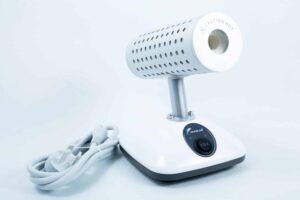The Infrared Steriliser Bacti Cinerator Lab tool features a white base, power switch, and attached lead, providing efficient sterilisation for laboratory instruments.