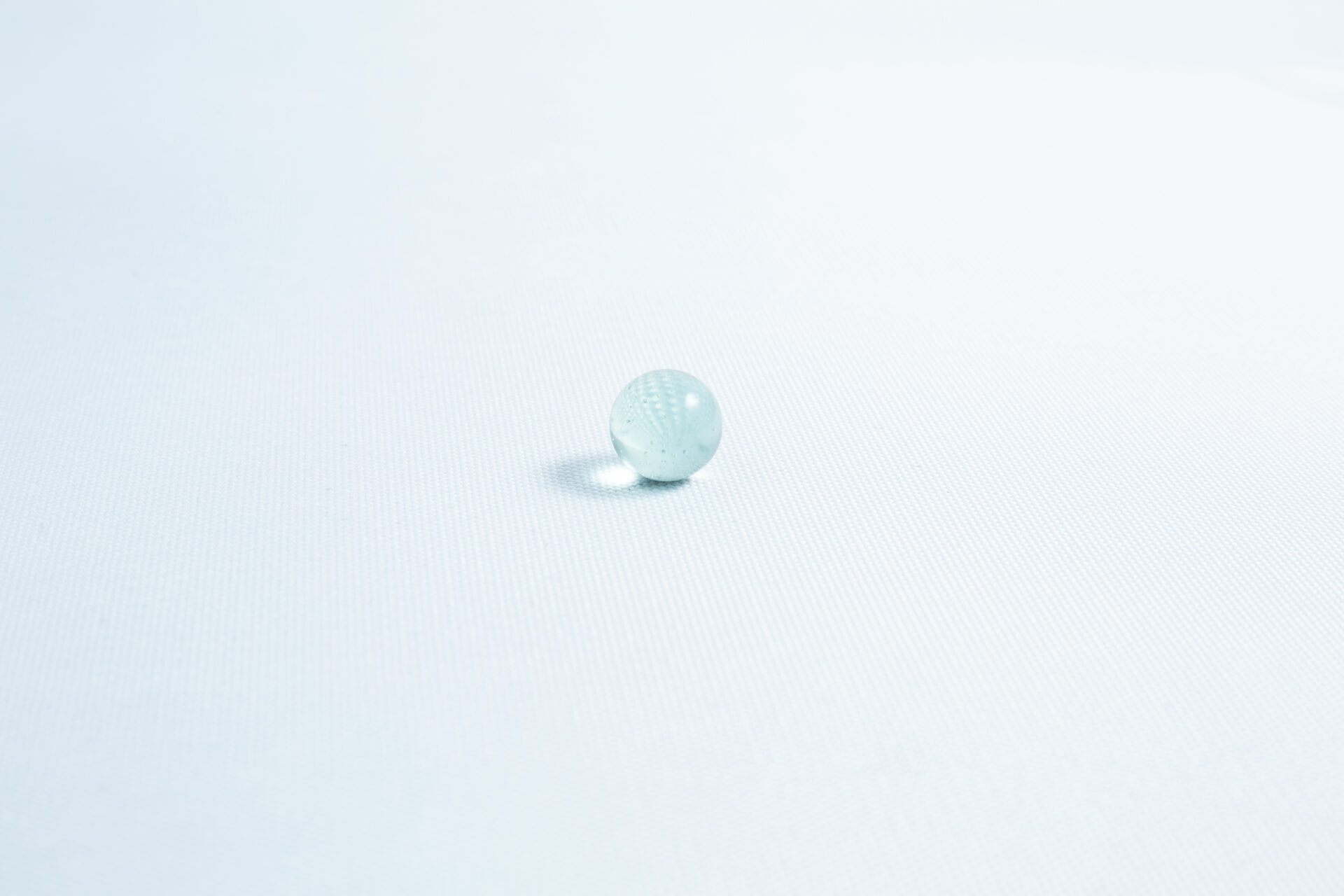 A single Mycology Ball Kilner jar with injection port and air vent (1L, genuine, autoclavable) rests on a plain white surface under soft lighting, highlighting its clarity.