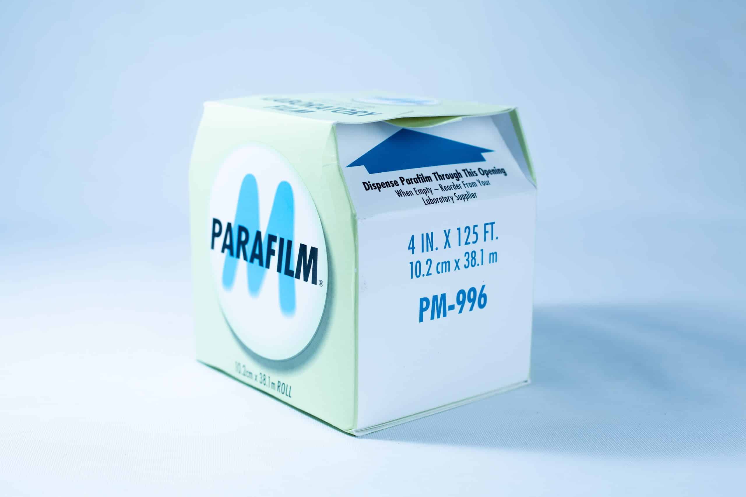 A box of Parafilm Lab sealing film, 4 in. x 125 ft., is placed on a light blue background.