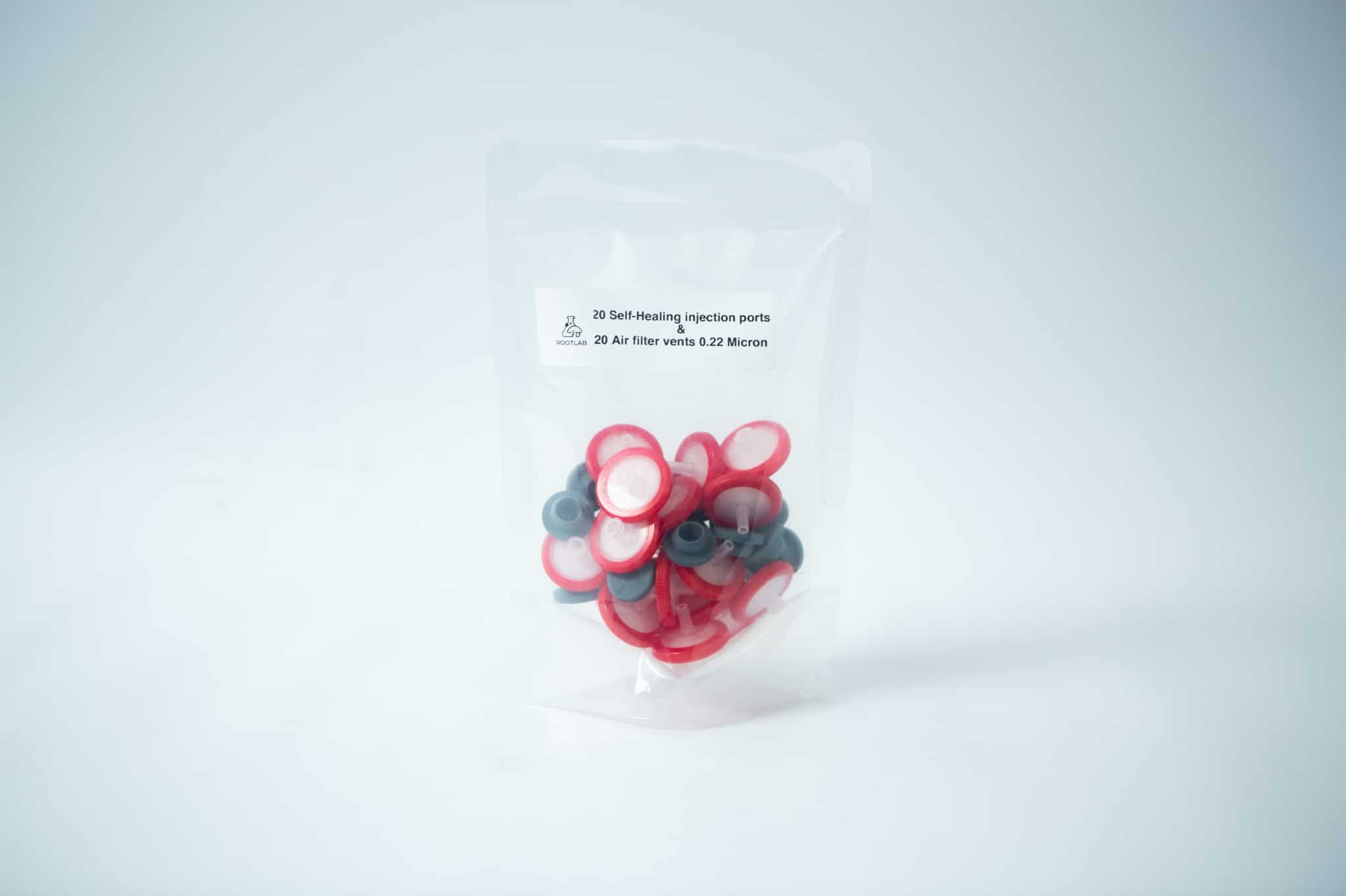 A clear bag with Rubber Self-Healing Injection Ports and PTFE Syringe Filters for Mycology, plus air filter vents, shown on a plain background.