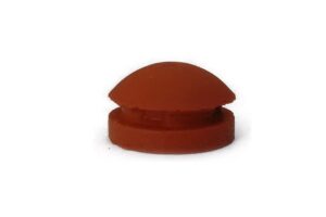 The All American rubber overpressure plug for steriliser, part 1010, is a small, round orange plug with a dome-shaped top, designed for use as an overpressure plug for sterilisers.