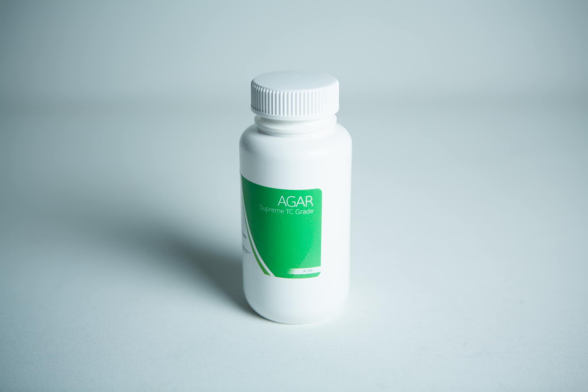 A white plastic bottle with a green label displaying "Plant Cell Tissue Culture Starter Kit" on a plain white background.