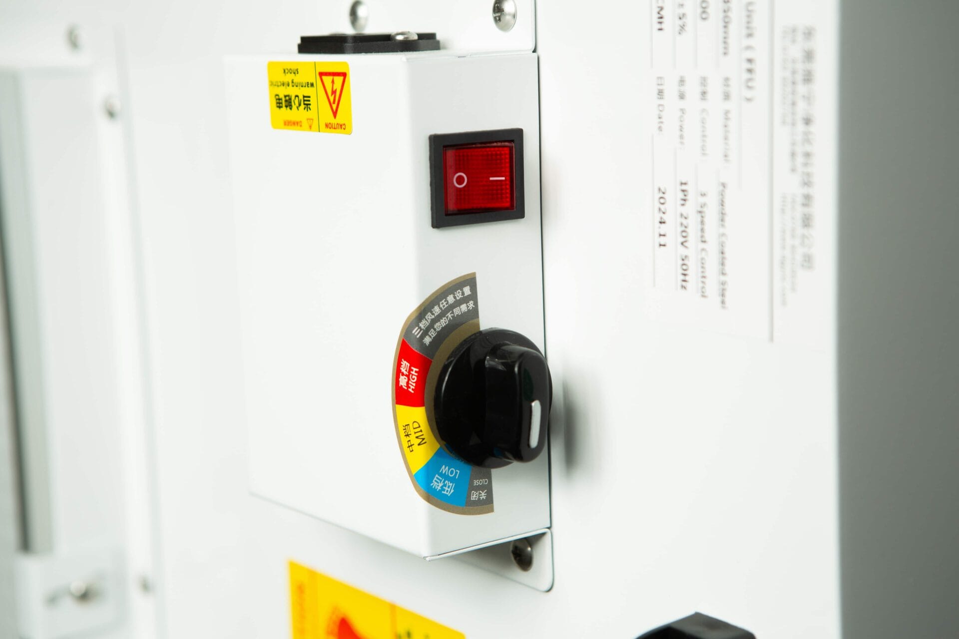 Close-up of the Laminar Flow Hood H14 with pre-filter 120x60x35cm control panel, featuring a black switch, red power button, and warning labels.