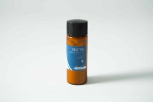 Brown bottle with black cap and blue label reading “Plant Cell Kinetin Powder” on a plain light background.