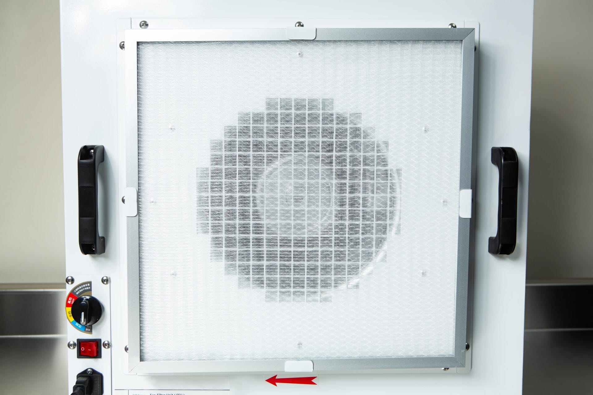 Close-up of the Laminar Flow Hood HEPA Airfilter H14 with prefilter (60x60x35cm), showing its filter, side handles, and a red arrow pointing left.