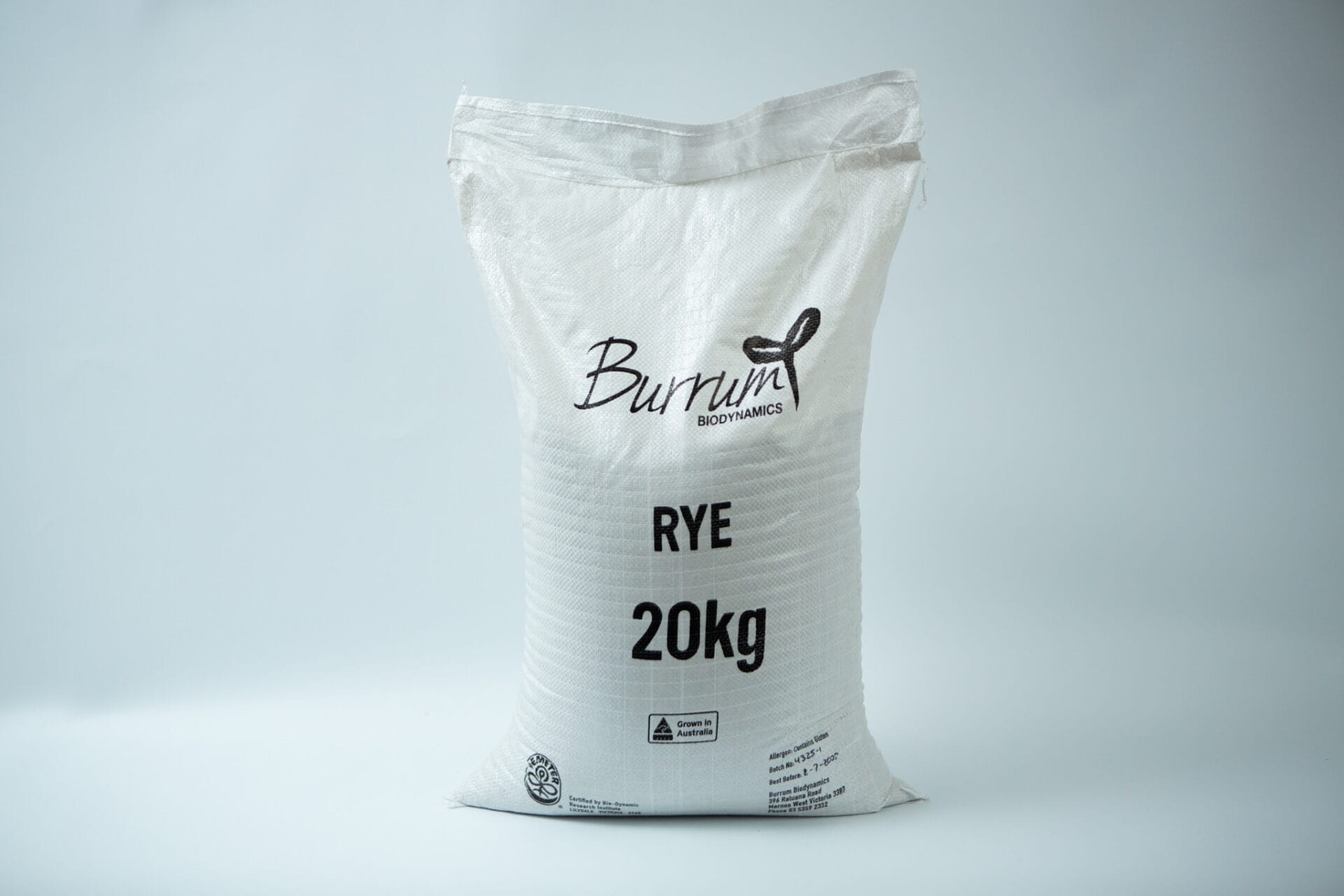A white 20kg sack labelled Certified Organic Biodynamic Rye berry grain stands upright on a light background, filled with premium rye berries.