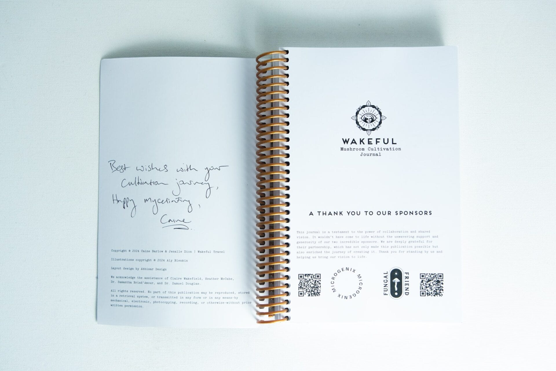 Wakeful Mushroom Cultivation Journal by Australian mycologist Caine Barlow, open to a handwritten note on the left page and a printed sponsor thanks on the right page.