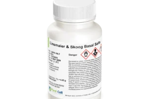 A white bottle labelled “Plant Cell Linsmaier & Skoog (LS) Basal Salts” displays hazard symbols and safety information, making it ideal for plant cell culture applications.