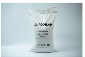 A 20kg white bag labelled Rootlab Lupin Hull Pellets 100% Non-GM Australian Grown stands on a plain light background.