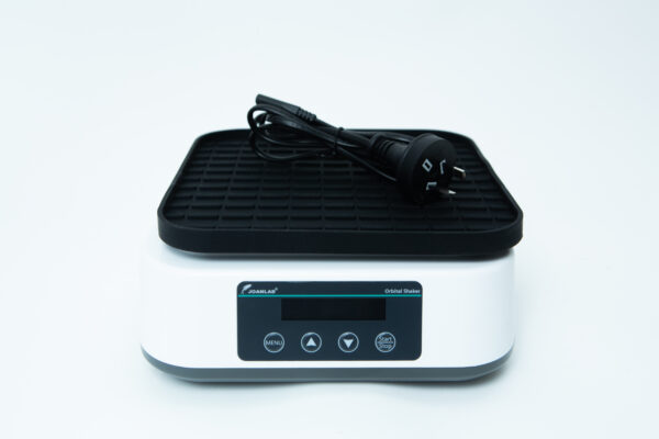 A digital laboratory orbital shaker with a power lead placed on top, on a white background.