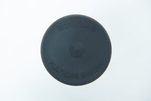 Black circular rubber lid for Silicone Mason Jar | Wide Mouth, featuring ROOTLAB and WIDE MOUTH embossed on top, designed to fit wide mouth jars.